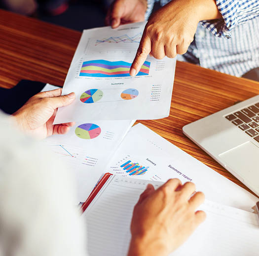 Financial,accounting,investment advisor consulting with her team at office 