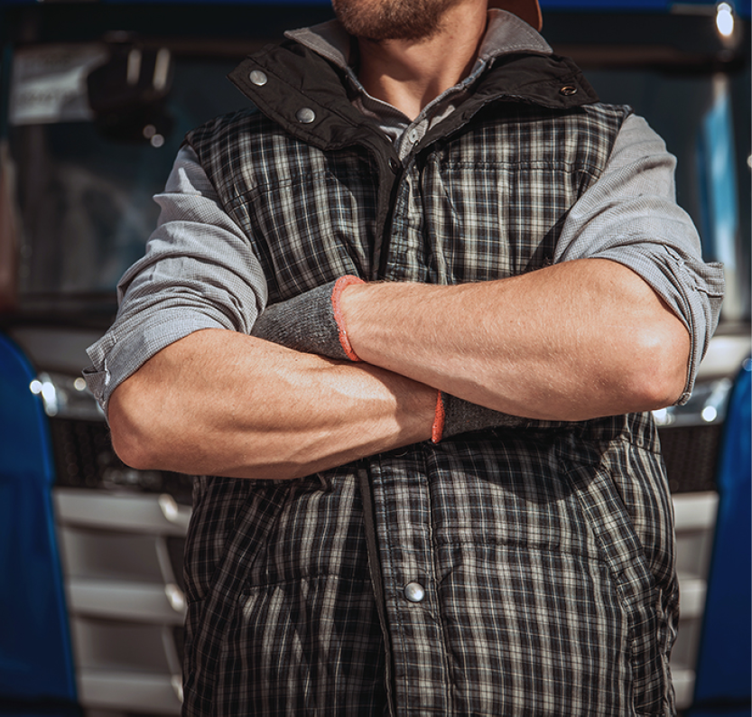 Truck Driver Workhorse  Caucasian Men in Front of His Vehicle with Crossing Arms  Powerful Transportation Industry Concept 