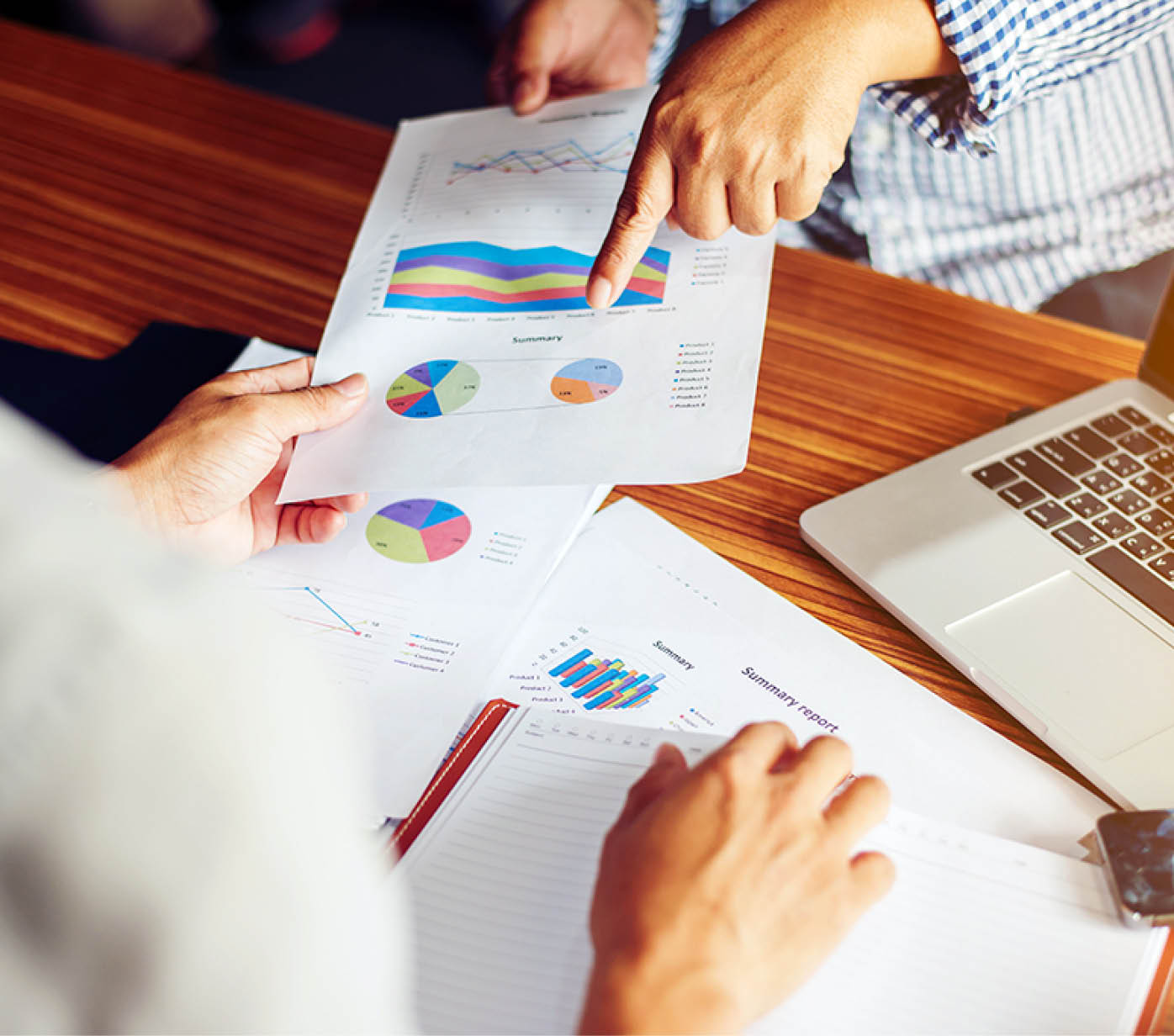 Financial,accounting,investment advisor consulting with her team at office 