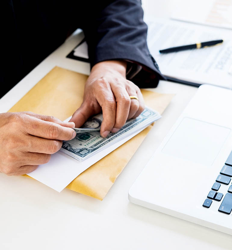 business man counting money at the table, accounting concept 