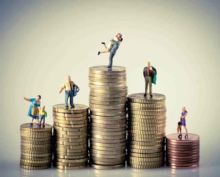 Faily budget concept  Miniature family on coins pile  Macro photo