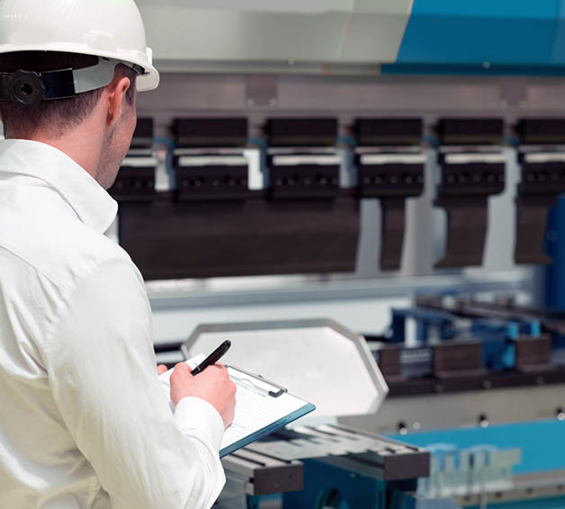 Technology Engineer Working in Factory  Holding check-list and supervising