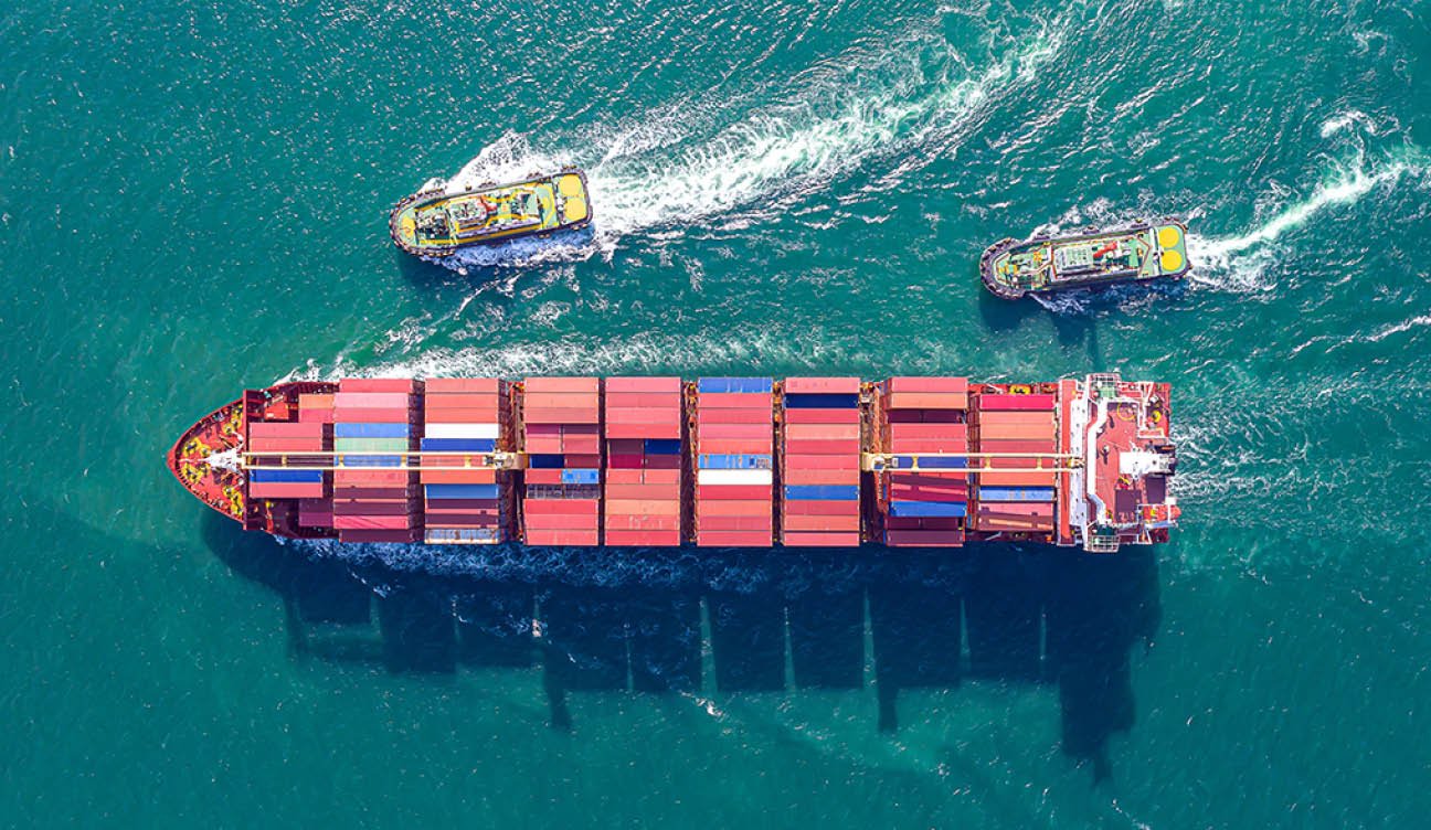 Aerial top view of cargo ship carrying container for import export goods  to customer,concept logistic and supply chain 